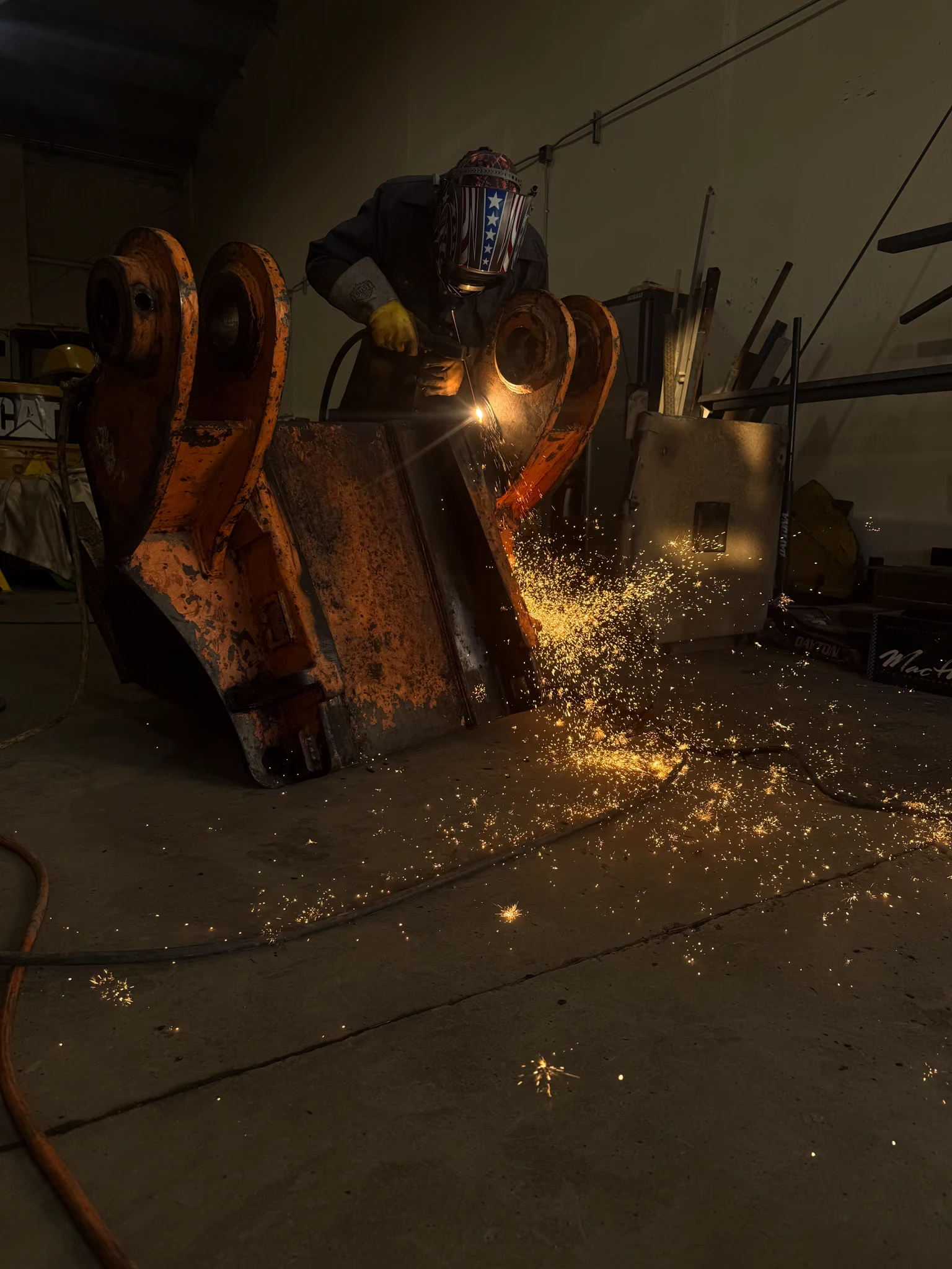 Welding on a Bucket attachment for large equipment